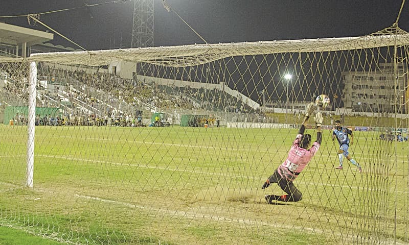 PIA goalkeeper Bilal saves PAF penalty (pic by Ali Salman DAWN)